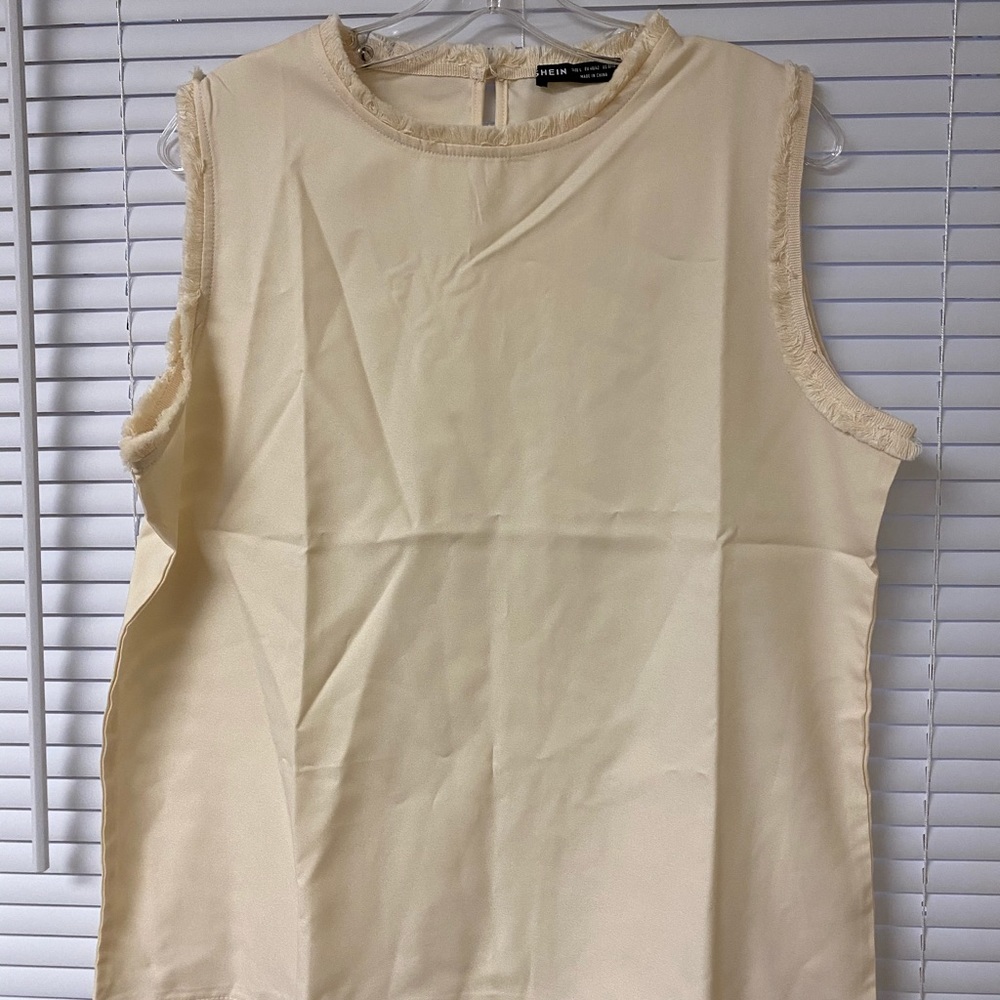 Brand New off white sleeveless blouse